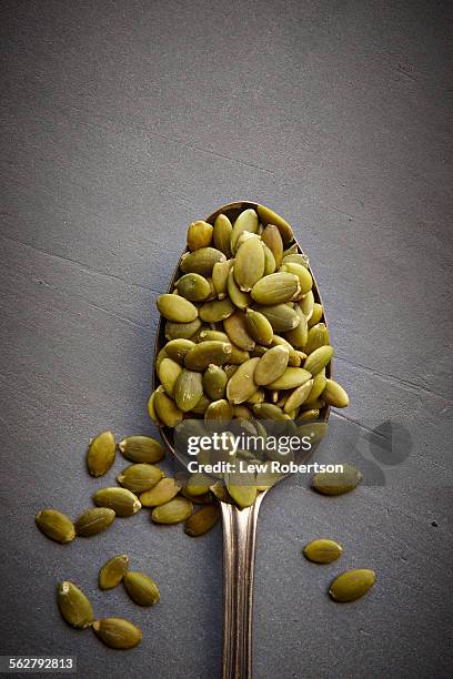 pumpkin seeds - pumpkin seed stock pictures, royalty-free photos & images