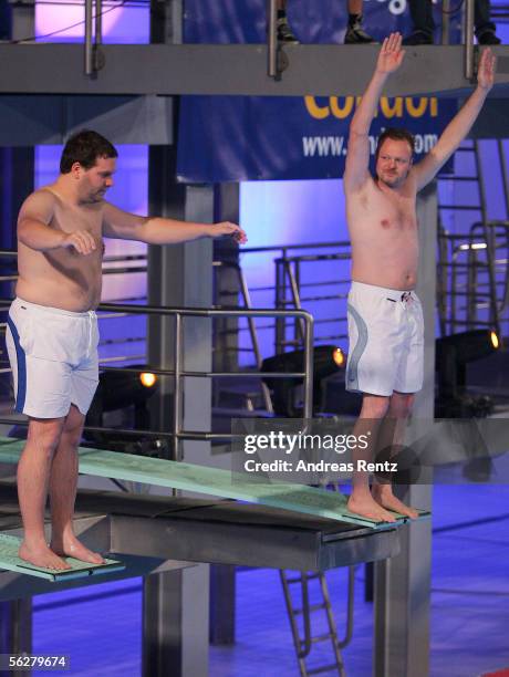 Television presenter Stefan Raab and Elton prepare for their dive during the Stefan Raab 'TV Total Turmspringen' - TV Show at the swimarena at the...