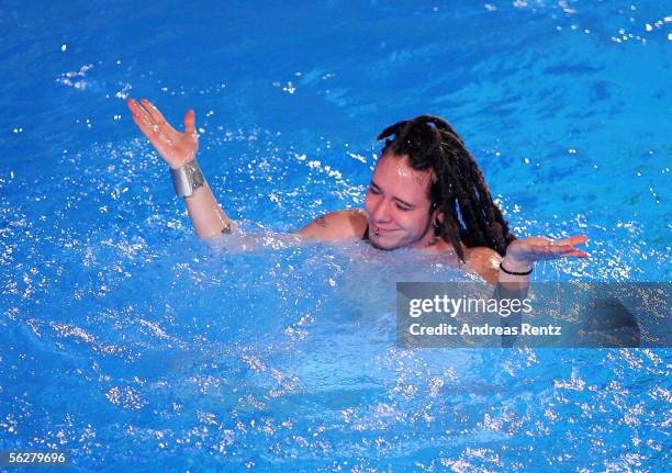 Singer Izzy Galegos of the boygroup 'US5' gestures after his jump from a 3 meter platform during the Stefan Raab 'TV Total Turmspringen' - TV Show at...