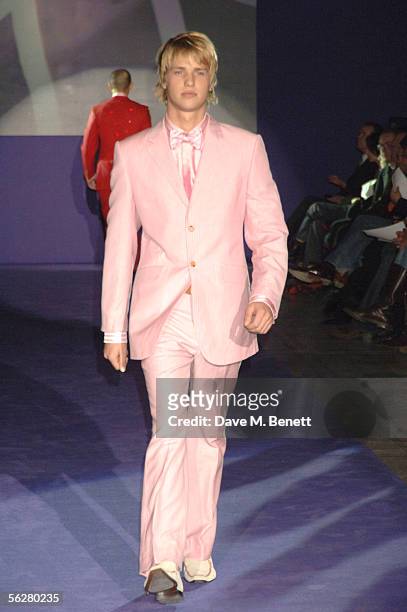 Sam Branson walks the runway at the "Fashion In Motion: Ozwald Boateng" catwalk show and 20th anniversary party at Victoria & Albert Museum on...