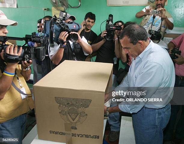 Honduras' presidential hopeful Porfirio Lobo of the National Party gets ready to cast his vote 27 November 2005 in the municipality of Juticalpa,...