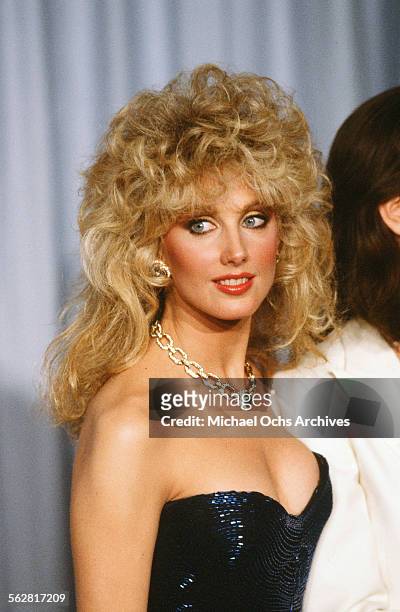 Actress Morgan Fairchild poses backstage during the 54th Academy Awards at Dorothy Chandler Pavilion in Los Angeles,California.