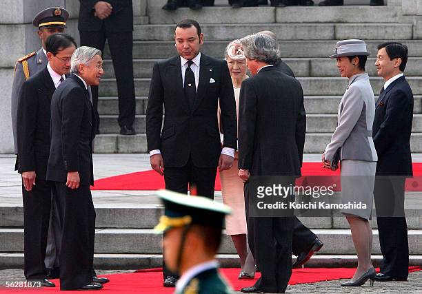 King of Morocco Mohammed VI is greeted by Japanese Emperor Akihito, Empress Michiko, Prime Minister Junichiro Koizumi, Princess Takamado and Crown...
