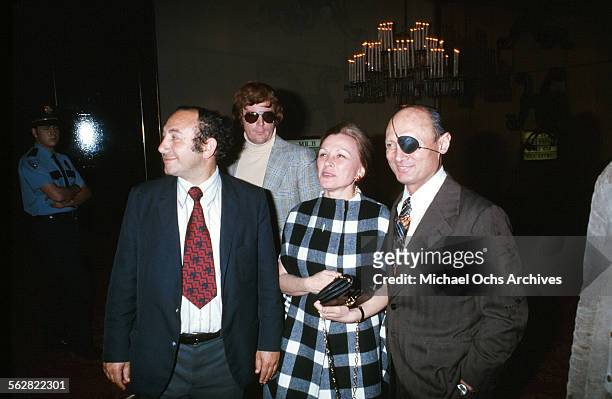 Defense Minister of Israel, Moshe Dayan with his wife Rachel arrives to the 47th Academy Awards at Dorothy Chandler Pavilion in Los...