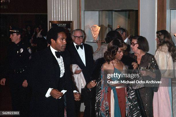 Simpson and his wife Marguerite Whitley arrive to the 47th Academy Awards at Dorothy Chandler Pavilion in Los Angeles,California.