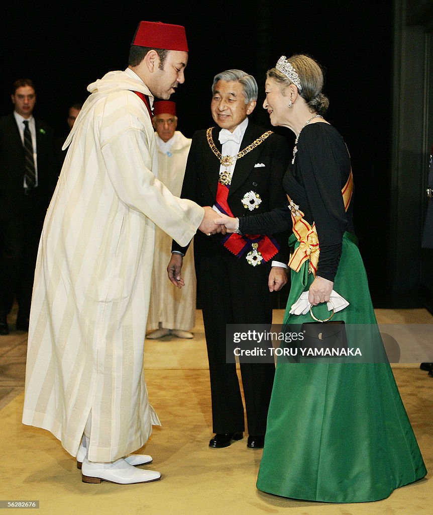 Morocco's King Mohammed VI (L) is welcom