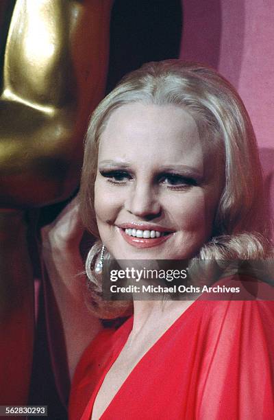 Performer Peggy Lee poses backstage after singing "The Way We Were" during the 46th Academy Awards at Dorothy Chandler Pavilion in Los...