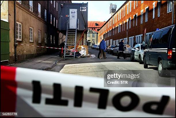 Danish police investigate Saturday 26 March 2005 the crime scene in central Copenhagen, where the cut up body parts of Danish taxi driver Torben Vagn...