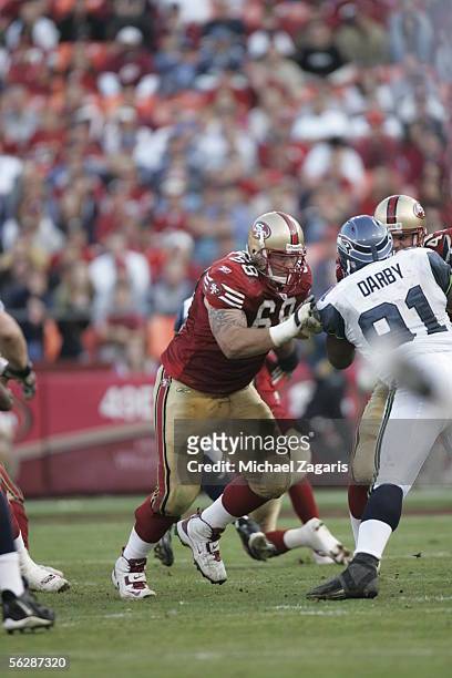Offensive guard Adam Snyder of the San Francisco 49ers blocks against the Seattle Seahawks during the NFL game at Monster Park on November 20, 2005...