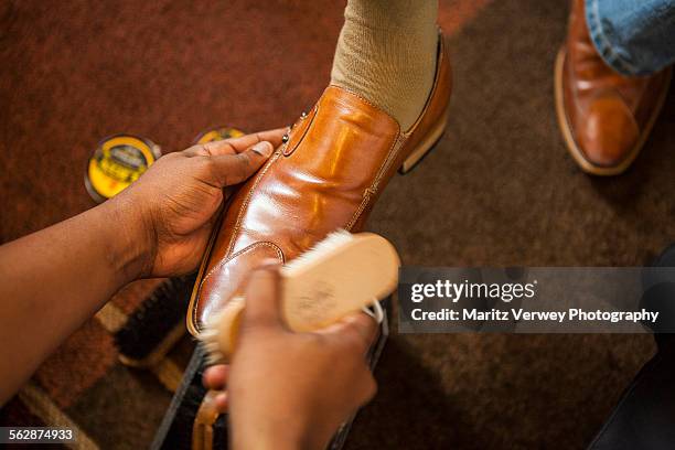 shoe cleaner - shoeshiner stock pictures, royalty-free photos & images