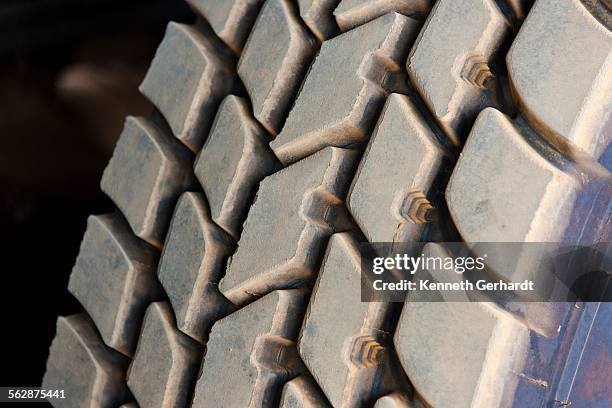 heavy duty tyre tread, angola, luanda bay - luanda bay stock pictures, royalty-free photos & images