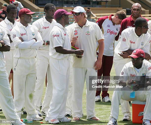 Brian Lara of the West Indies and Shane Warne of Australia chat during the presentations after day five of the Third Test between Australia and the...