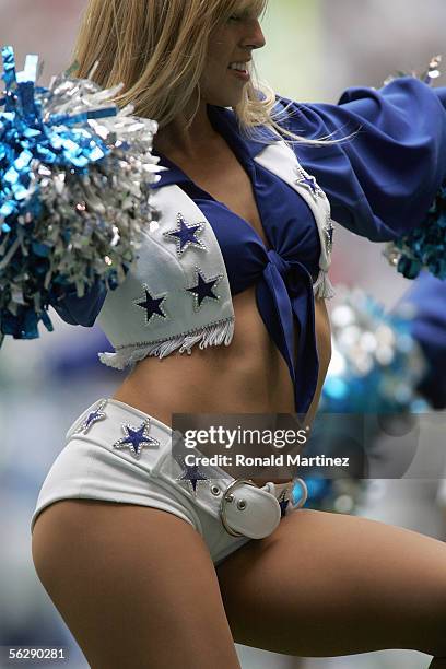 Dallas Cowboys cheerleader performs during the game between the Dallas Cowboys and the Detroit Lions on November 20, 2005 at Texas Stadium in Irving,...