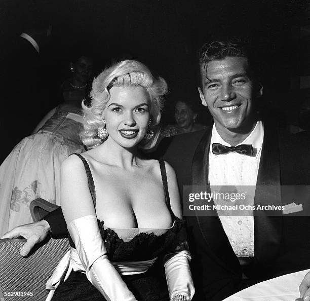 Actress Jayne Mansfield and Mickey Hargitay attend the Makeup Artist Ball in Los Angeles,California.