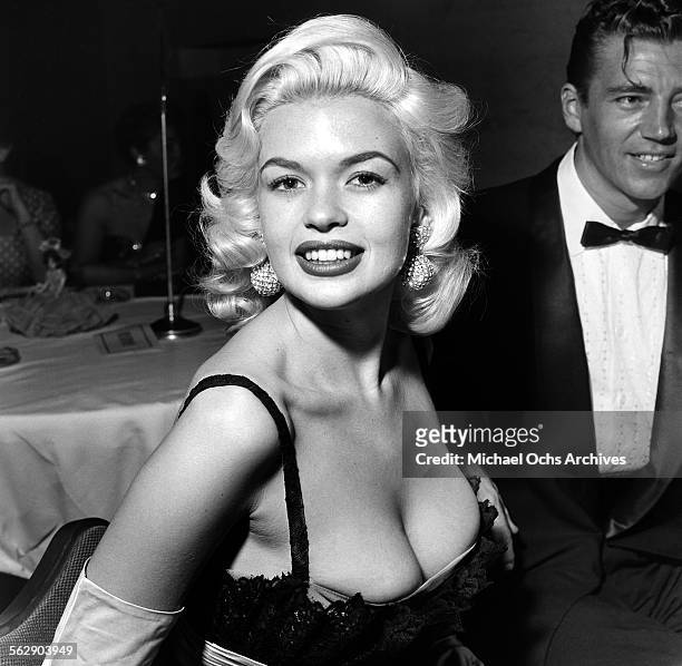 Actress Jayne Mansfield and Mickey Hargitay attend the Makeup Artist Ball in Los Angeles,California.