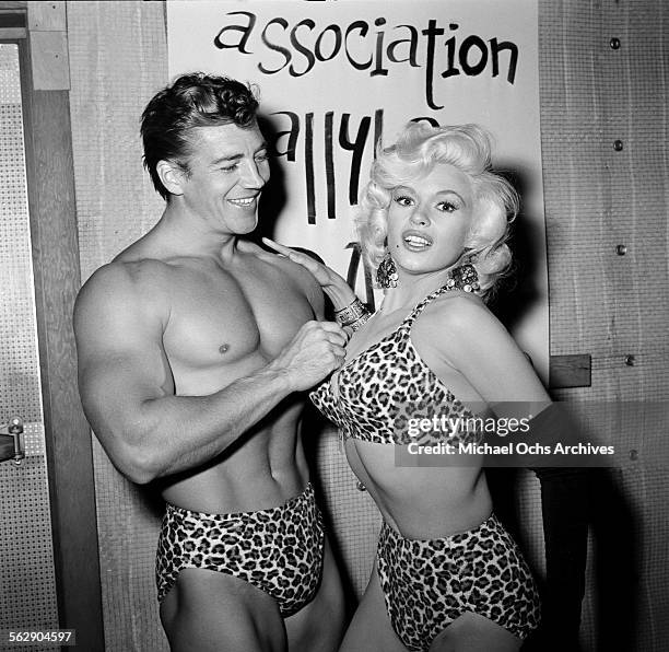 Actress Jayne Mansfield and Mickey Hargitay attend a Halloween party in Los Angeles,California.