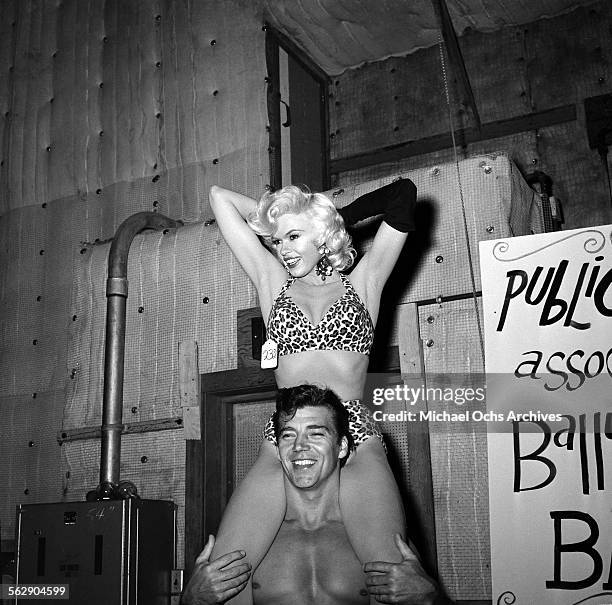 Actress Jayne Mansfield and Mickey Hargitay attend a Halloween party in Los Angeles,California.