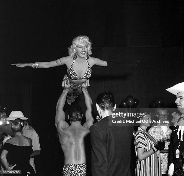 Actress Jayne Mansfield attends Carroll Righter's Costume party in Los Angeles,California.