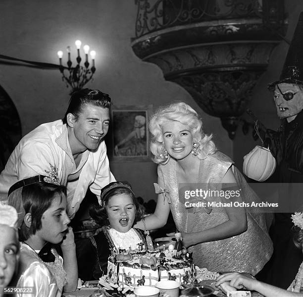 Actress Jayne Mansfield and Mickey Hargitay have a Halloween and Birthday party for daughter Jayne Marie Mansfield in Los Angeles,California.