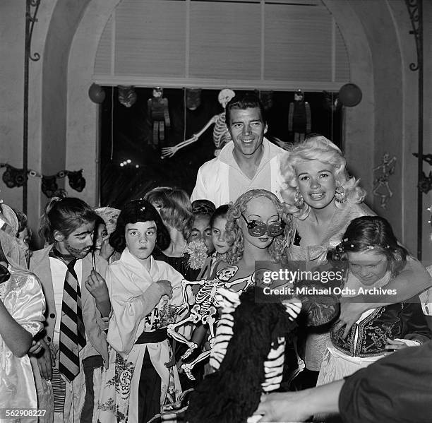 Actress Jayne Mansfield and Mickey Hargitay have a Halloween and Birthday party for daughter Jayne Marie Mansfield in Los Angeles,California.