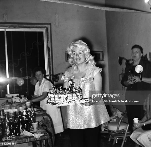 Actress Jayne Mansfield and Mickey Hargitay have a Halloween and Birthday party for daughter Jayne Marie Mansfield in Los Angeles,California.