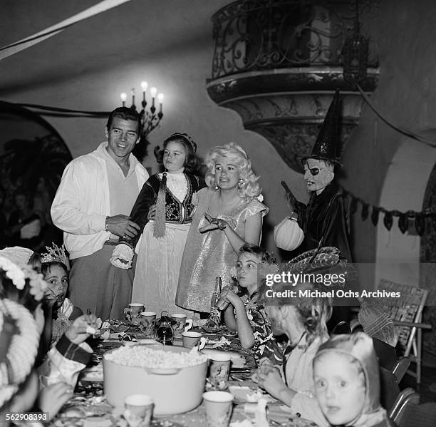 Actress Jayne Mansfield and Mickey Hargitay have a Halloween and Birthday party for daughter Jayne Marie Mansfield in Los Angeles,California.