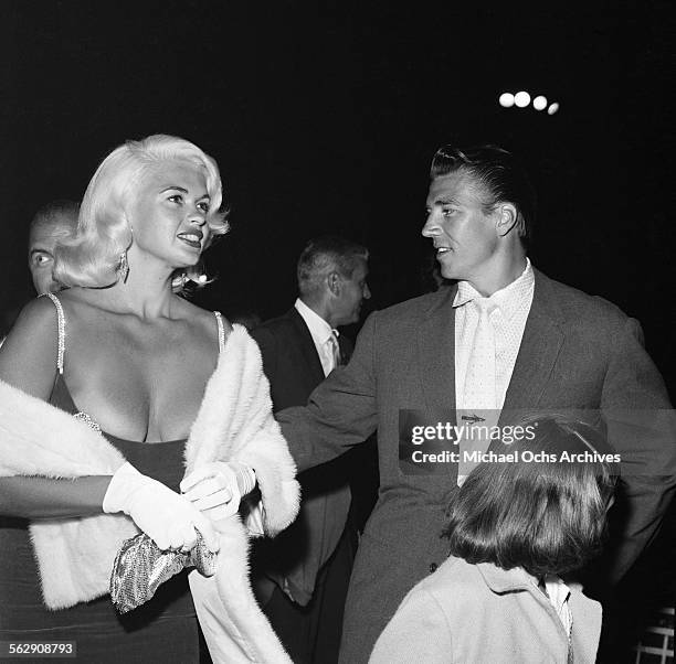 Actress Jayne Mansfield and Mickey Hargitay with daughter Jayne Marie Mansfield attend an event in Los Angeles,California.