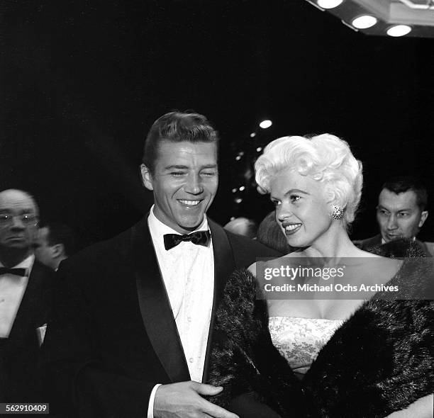 Actress Jayne Mansfield and Mickey Hargitay attend the premiere of "Payton Place" in Los Angeles,California.