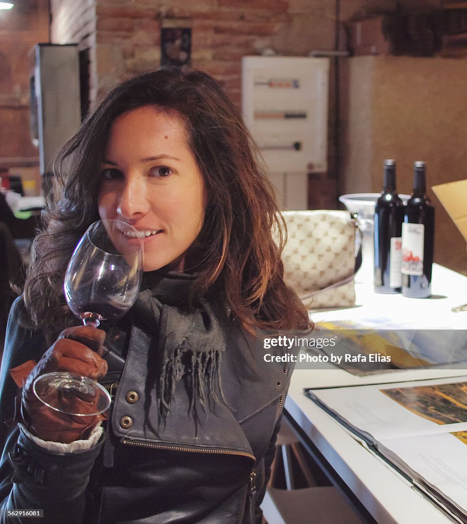 Pretty woman drinking red wine