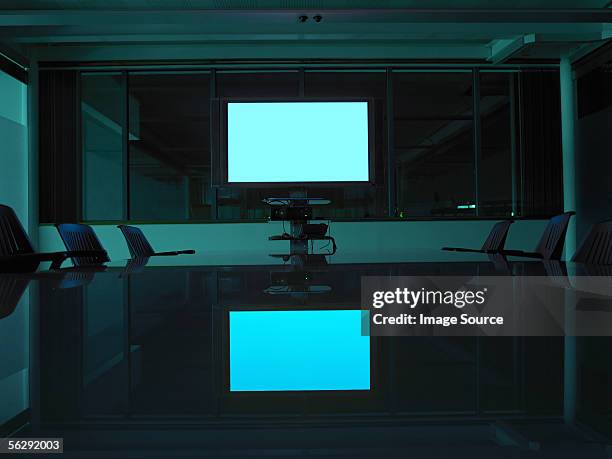 a screen in an empty board room - conference room screens stock pictures, royalty-free photos & images