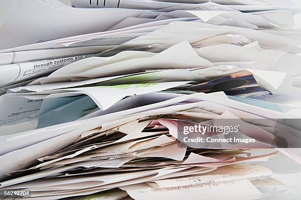 pile of receipts - stack of receipts stock pictures, royalty-free photos & images