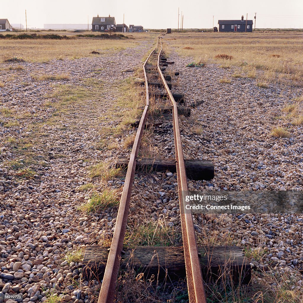 Railway track through some houses