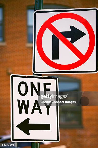 road signs - one way stock pictures, royalty-free photos & images