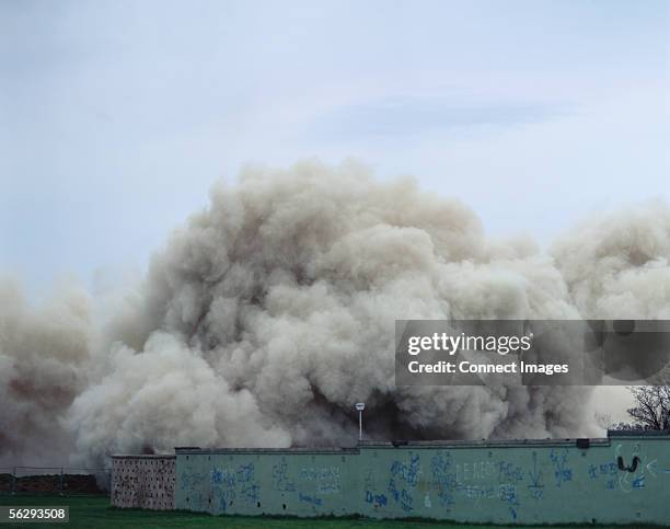 dust cloud - wall collapsing stock pictures, royalty-free photos & images