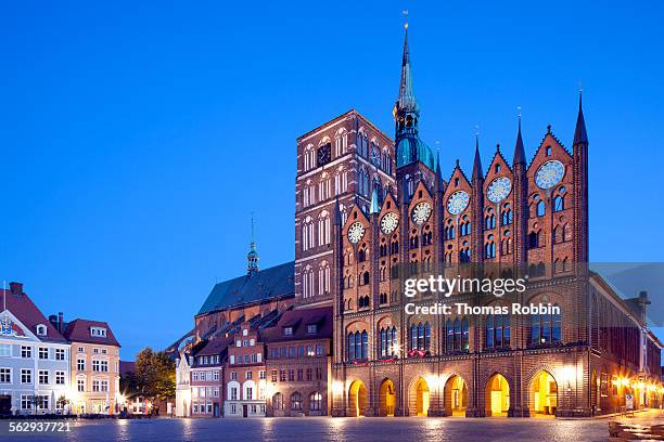 stralsund town hall with origins from the 13th century, facade in the old market, next to st. nicholas church, stralsund, mecklenburg-western pomerania, germany - stralsund stock pictures, royalty-free photos & images