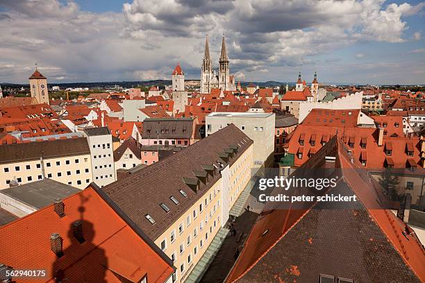 rooftops of the historic centre with the clock tower of old town hall and regensburg cathedral, regensburg, bavaria, germany - regensburg stock-fotos und bilder