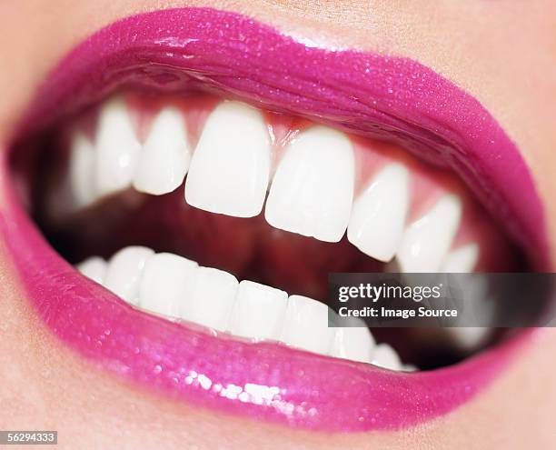 woman smiling - perfektion stock-fotos und bilder