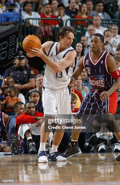 Point guard Steve Nash of the Dallas Mavericks holds the ball during the NBA game against the Houston Rockets at the American Airlines Center in...