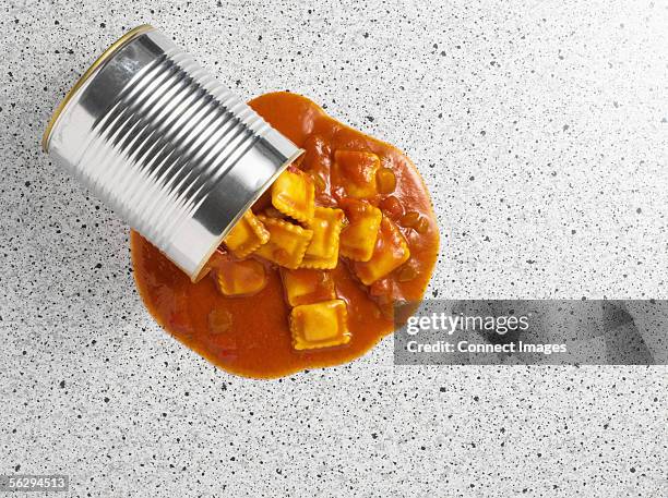 ravioli spilling from tin can - ravioli can stock pictures, royalty-free photos & images