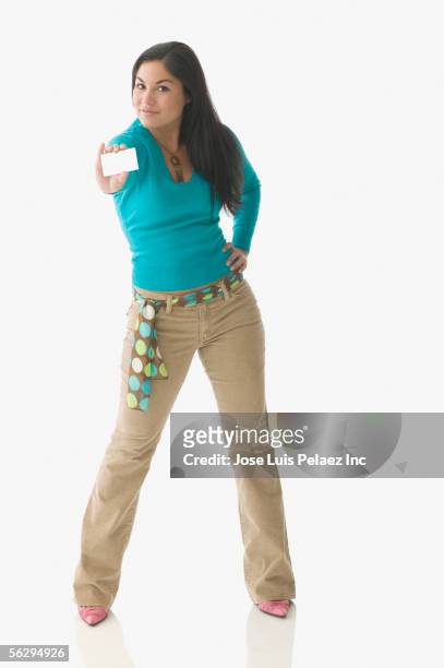 teen girl holding a credit card - skinny teen stockfoto's en -beelden
