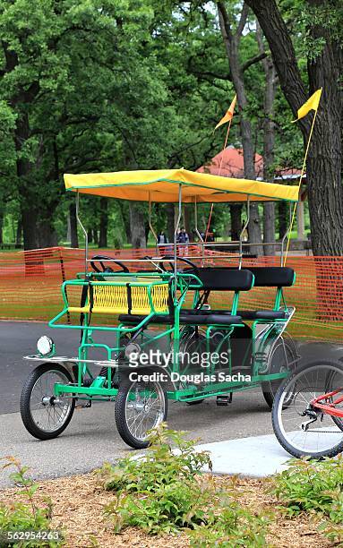 parked quadricycle tourist cycle - quadricycle photos et images de collection
