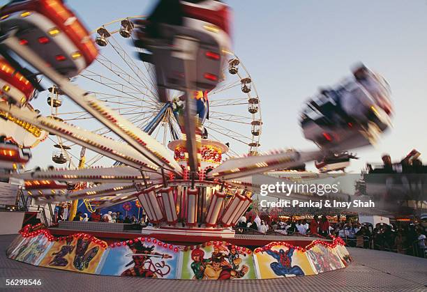 rides at the global village - global village stock pictures, royalty-free photos & images