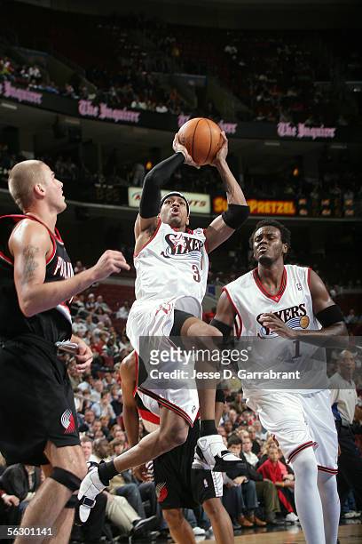 Allen Iverson of the Philadelphia 76ers shoots against Joel Przybilla of the Portland Trail Blazers on November 29, 2005 at the Wachovia Center in...