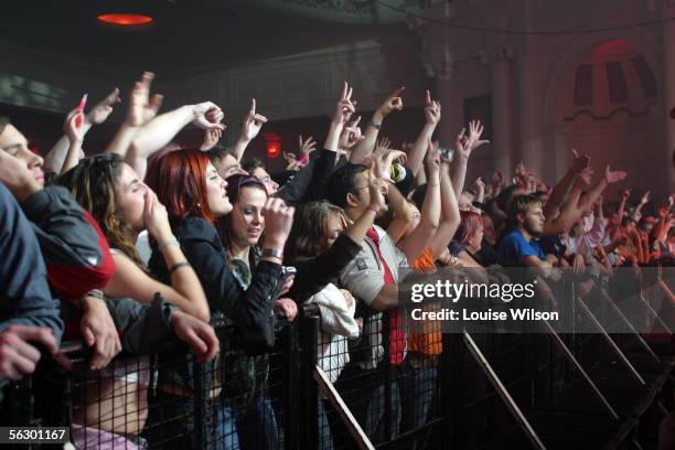 The crowd watches crossover dance outfit Faithless perform live at the Carling Academy Brixton on November 29, 2005 in London, England.