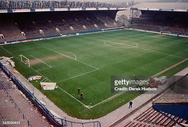 Groundskeepers busy working at Hillsborough Stadium the day after the stampede which resulted in the deaths of 96 people, Sheffield, 16th April 1989.