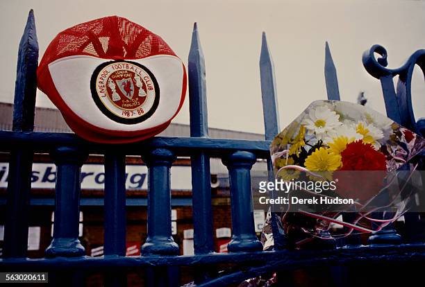 Tributes are placed outside the entrance to Hillsborough Stadium the day after the stampede which resulted in the deaths of 96 people, Sheffield,...