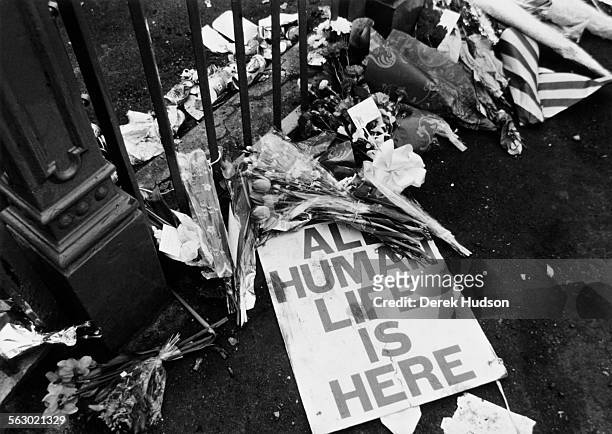 Tributes are placed outside the entrance to Hillsborough Stadium the day after the stampede which resulted in the deaths of 96 people, Sheffield,...