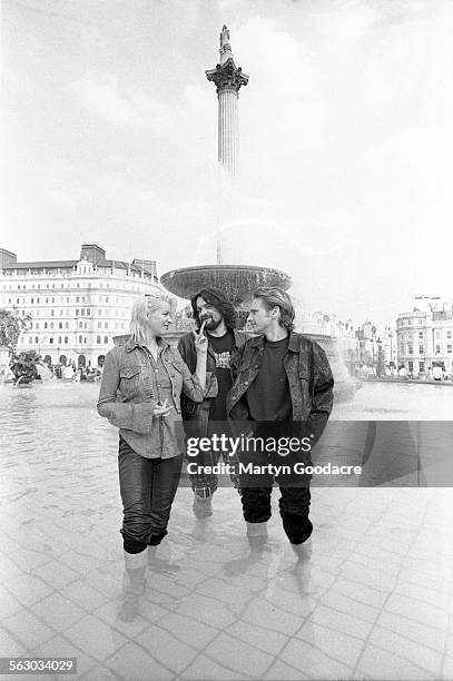 Group portrait of Scottish electronic band One Dove, Trafalgar Square, London, United Kingdom, 1992. L-R Dot Allison, Jim McKinven, Ian Carmichael.