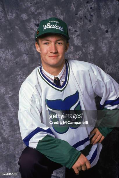Swedish professional hockey player Michael Nylander poses for a portrait in his new team jersey after he was drafted by the Hartford Whalers at the...