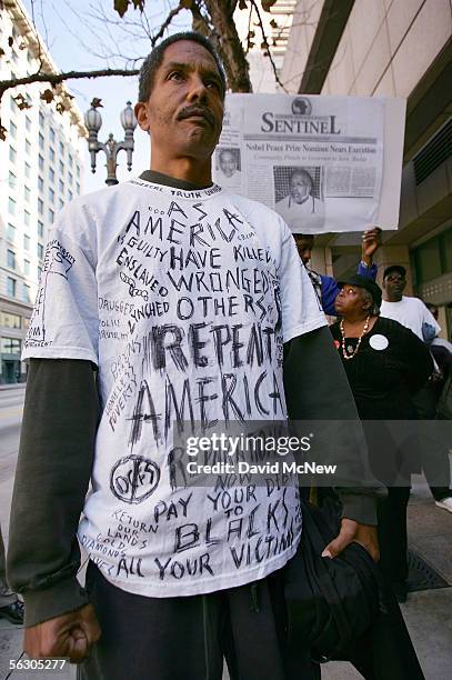 Warren Williams demonstrates in front of the office of California Gov. Arnold Schwarzenegger to urge the governor to grant clemency for convicted...